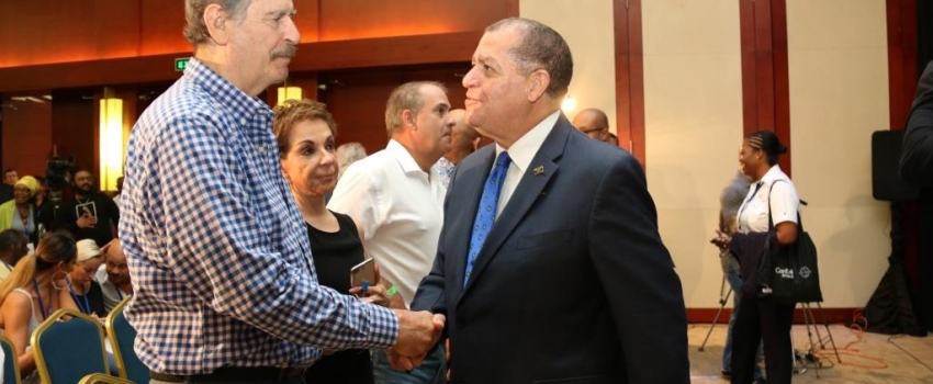 Hon. Audley Shaw (right), Minister of Industry, Commerce, Agriculture and Fisheries, greets Vicente Fox, former president of Mexico, at the 3rd Annual Global B2B Cannabis Conference & Expo, CanEx Jamaica, held at the Montego Bay Conference Centre on Friday, September 28, 2018.