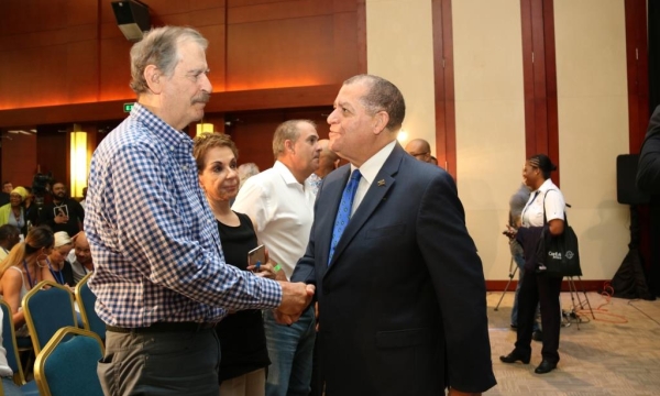Hon. Audley Shaw (right), Minister of Industry, Commerce, Agriculture and Fisheries, greets Vicente Fox, former president of Mexico, at the 3rd Annual Global B2B Cannabis Conference & Expo, CanEx Jamaica, held at the Montego Bay Conference Centre on Friday, September 28, 2018.