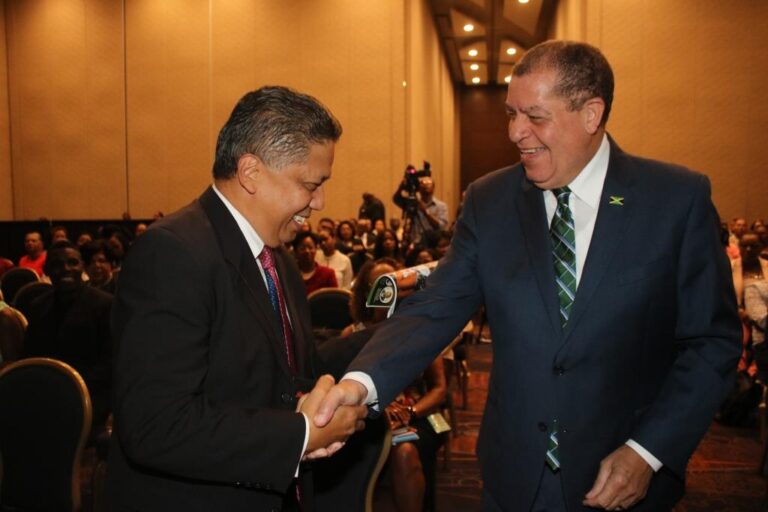 Hon Audley Shaw and David Wan