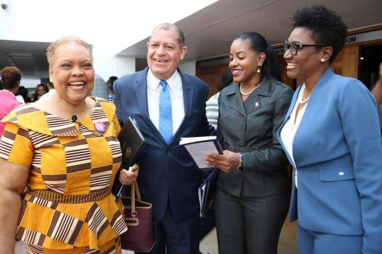 Hon. Audley Shaw (2nd left), Minister of Industry, Commerce, Agriculture and Fisheries, shares a light moment with (from left) Valerie Veira, Chief Executive Officer, Jamaica Business Development Corporation (JBDC); Avril Leonce, Director of SME Partnership and Development, and Audrey Tugwell, Executive Vice-President, Retail Banking, both of Scotiabank; at the opening ceremony of day one of the Employee Engagement Conference hosted by JBDC under the theme ‘Disturb. Reconnect. Engage’ at the Jamaica Confere