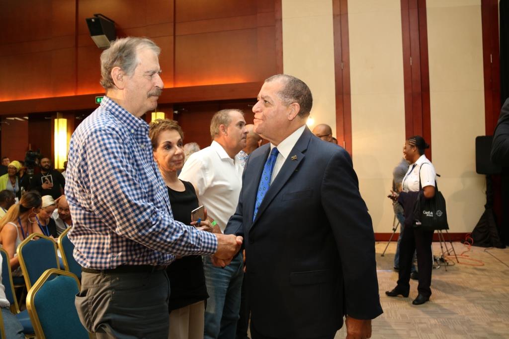Hon. Audley Shaw (right), Minister of Industry, Commerce, Agriculture and Fisheries, greets Vicente Fox, former president of Mexico, at the 3rd Annual Global B2B Cannabis Conference & Expo, CanEx Jamaica, held at the Montego Bay Conference Centre on Friday, September 28, 2018.