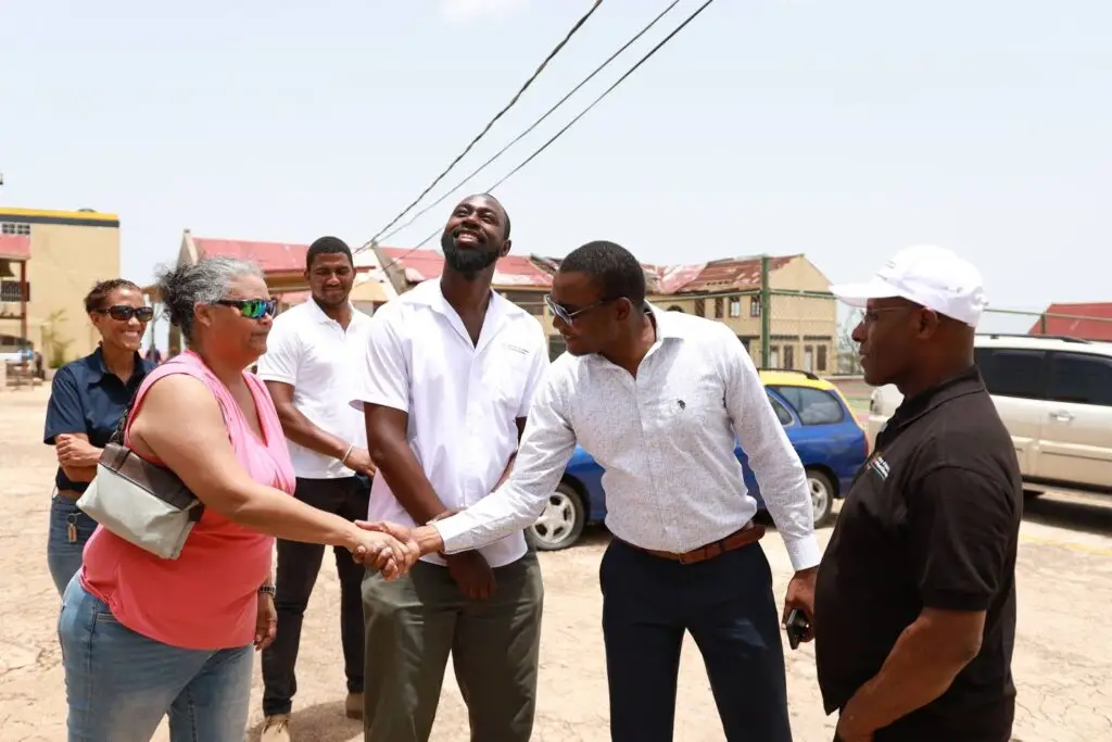 Senator Aubyn Hill (right), minister of industry, investment, and commerce, introduces Lise Walters (left), past vice-president of Jamaica Institution of Engineers, to Mark Smith, principal of Munro College. Looking on is Yushan Nelson, civil engineer at Peter Jervis & Associates Consulting Engineers and JIE member. In the backgroud are Jackie Hill Millington, managing director of Lydford Mining Company, and Darren Millington, project engineer.